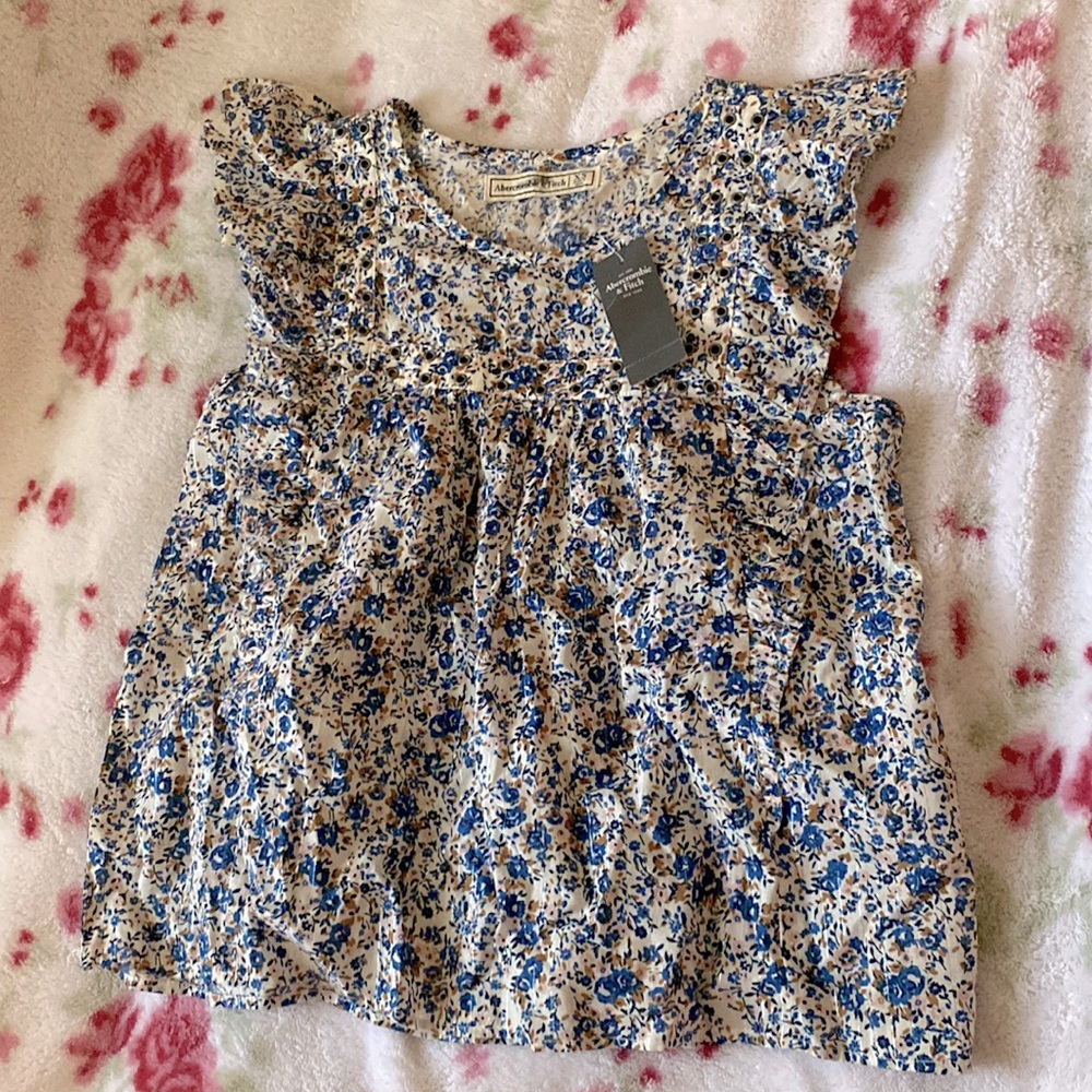 Beautiful detailed blouse. Never worn